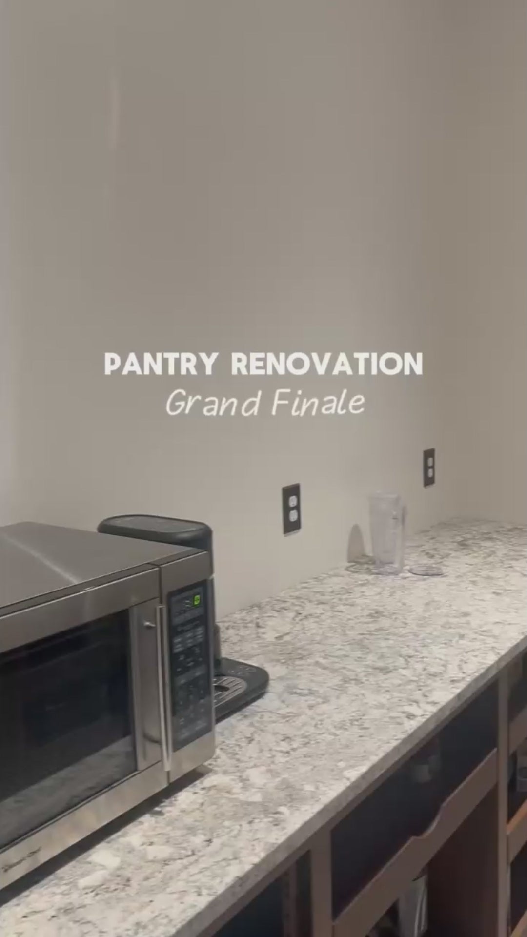 Floating shelves installed in kitchen with terrazzo countertop showing clean, minimalist wall storage